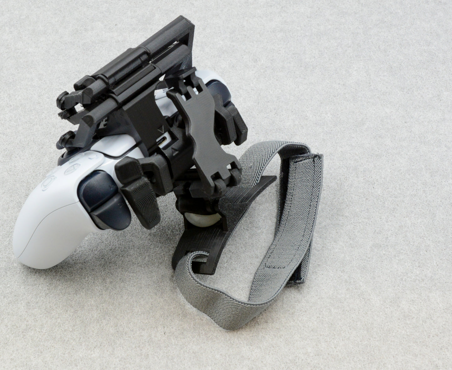 One-handed PS5 DualSense attachment