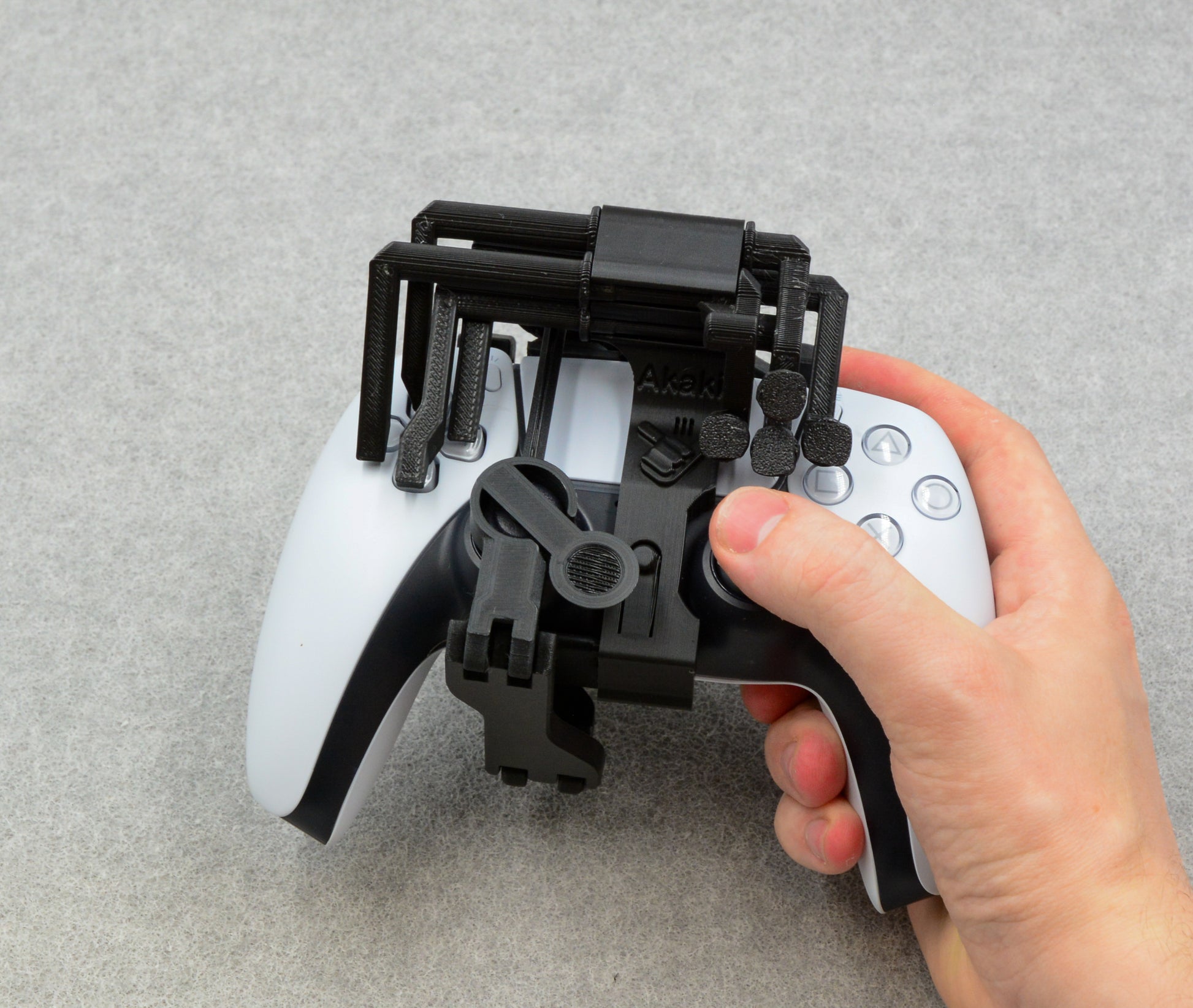 One-handed PS5 DualSense attachment – Akaki Controllers