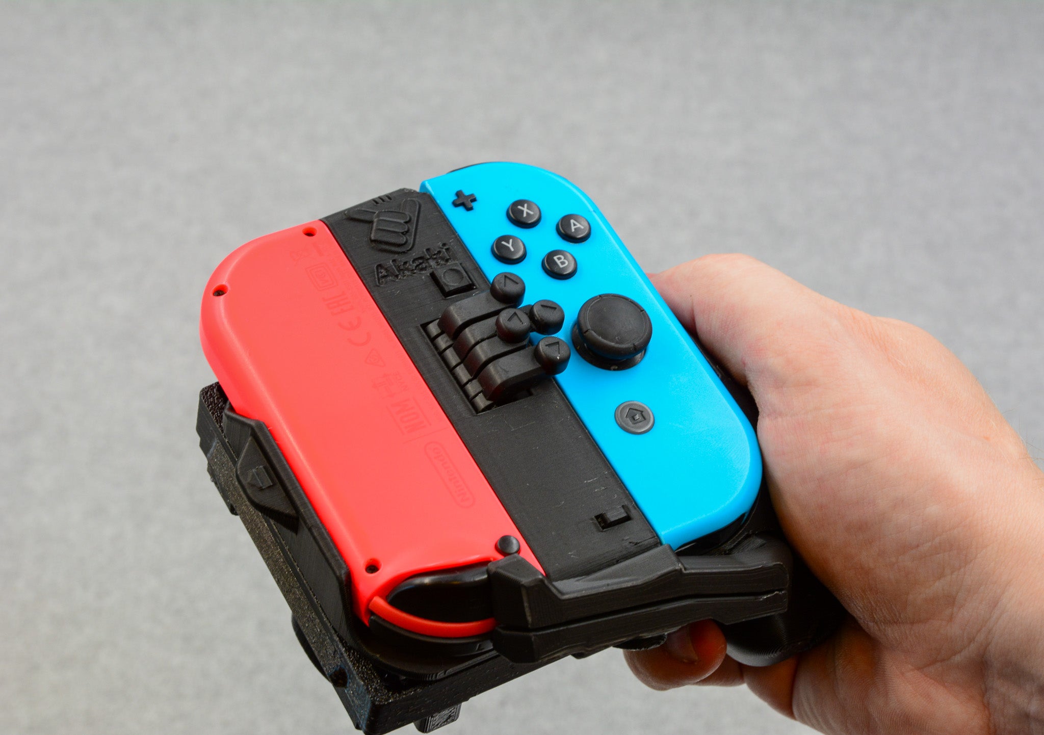 One handed joy con hot sale grip