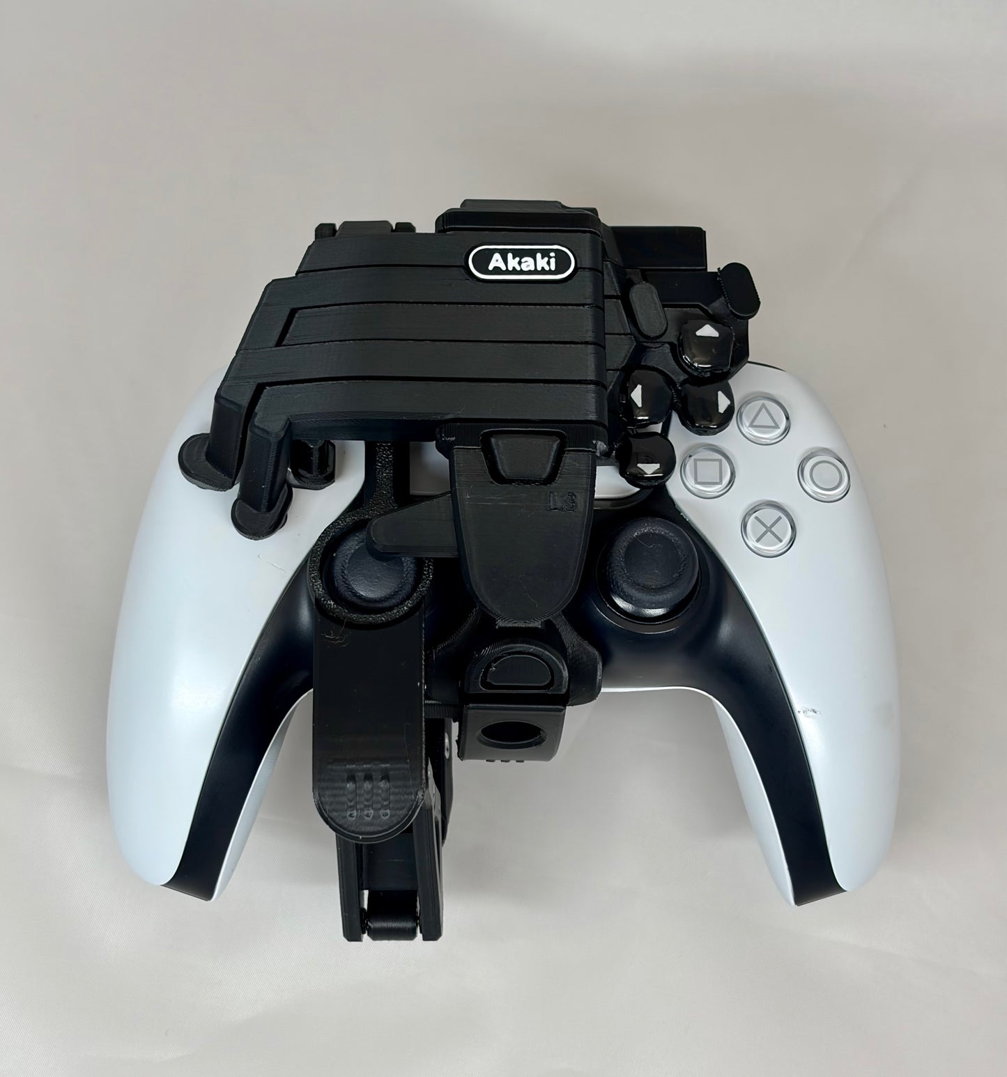 One-handed PS5 DualSense attachment 2