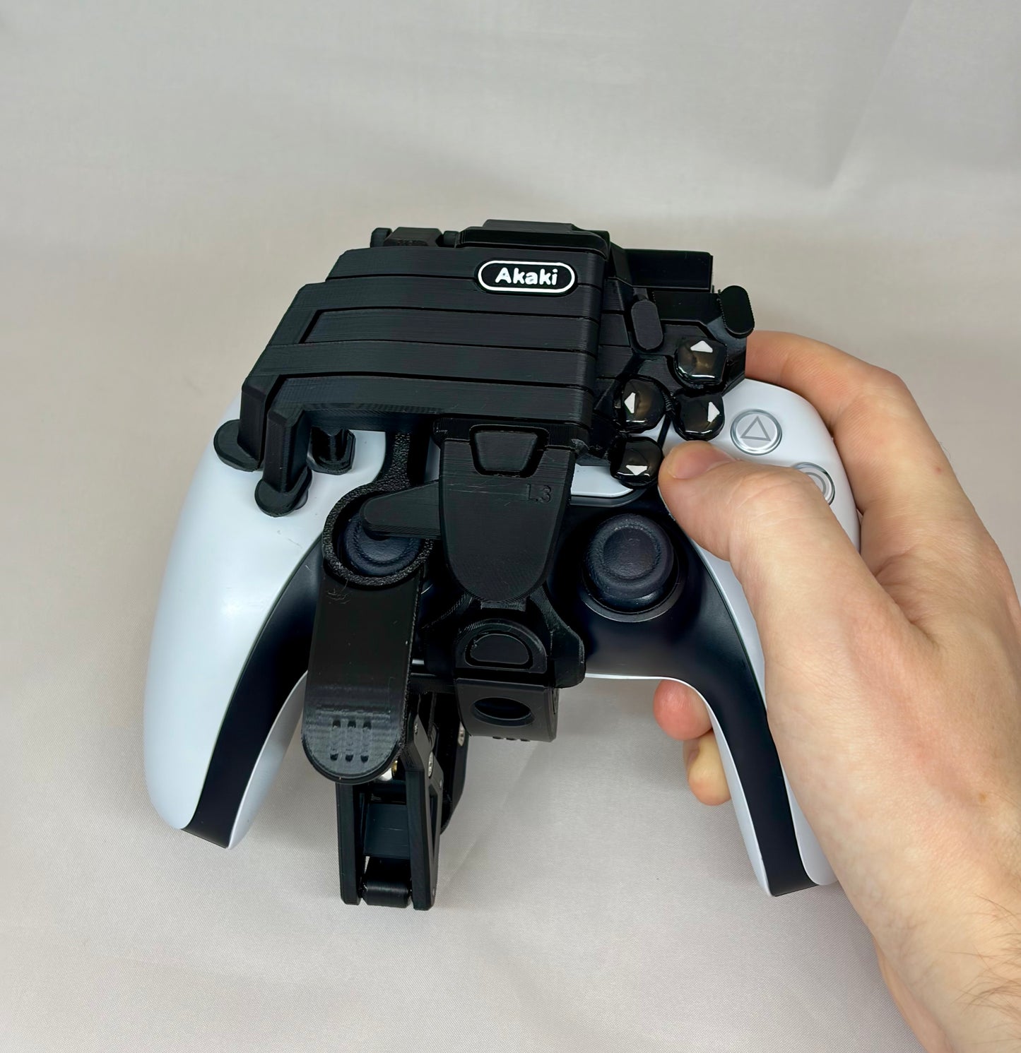 One-handed PS5 DualSense attachment 2