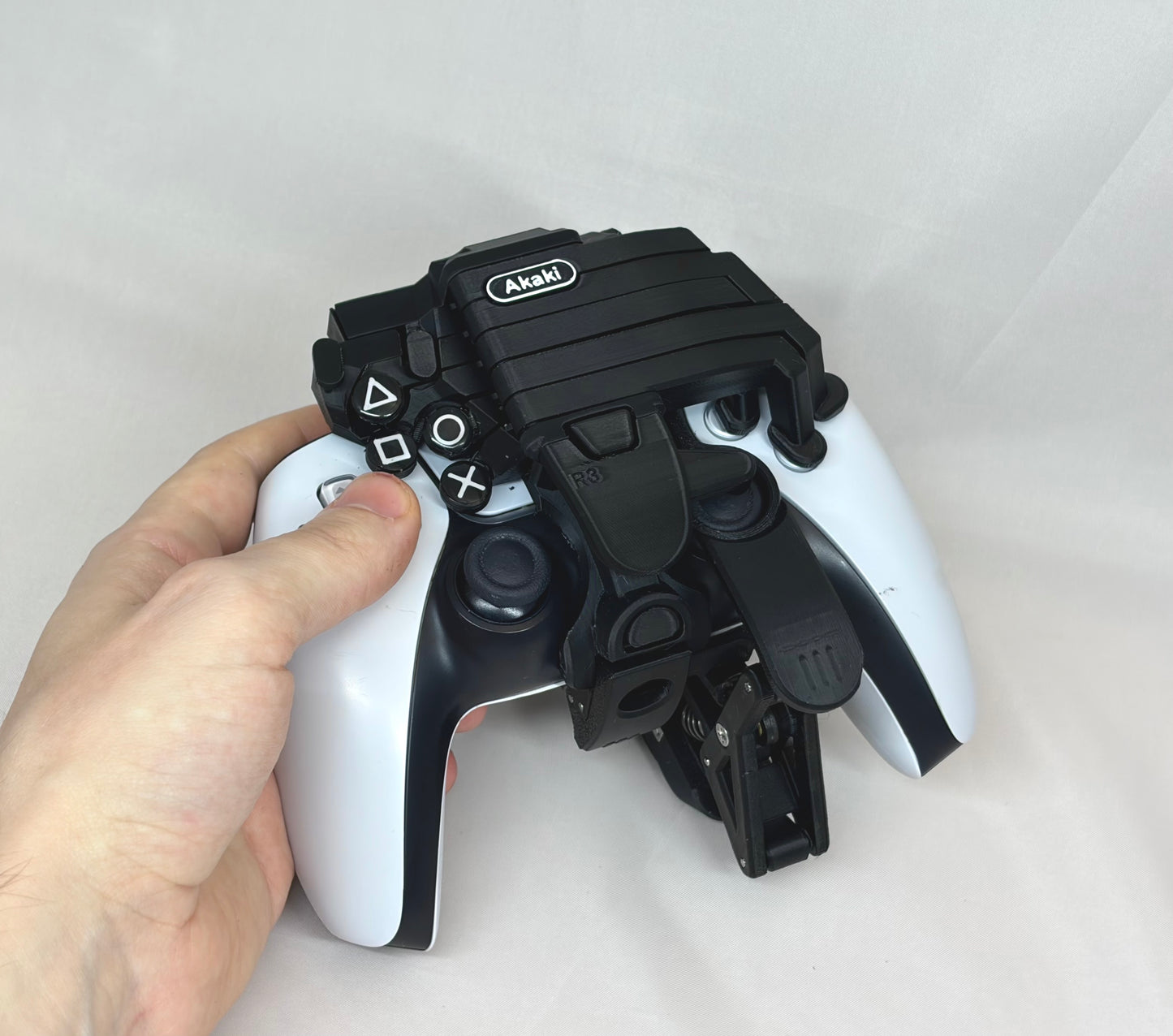 One-handed PS5 DualSense attachment 2